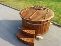 Old fashioned stainless steel wooden hot tub